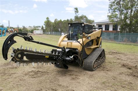 cat skid steer trencher|skid loader trencher attachment.